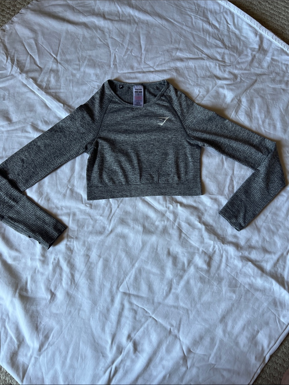 EUC Gymshark Vital Seamless
2.0 Long Sleeve Crop Top. Grey, Size med.